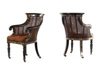 A Pair of William IV Parcel Gilt Japanned and Cane Upholstered Armchairs
