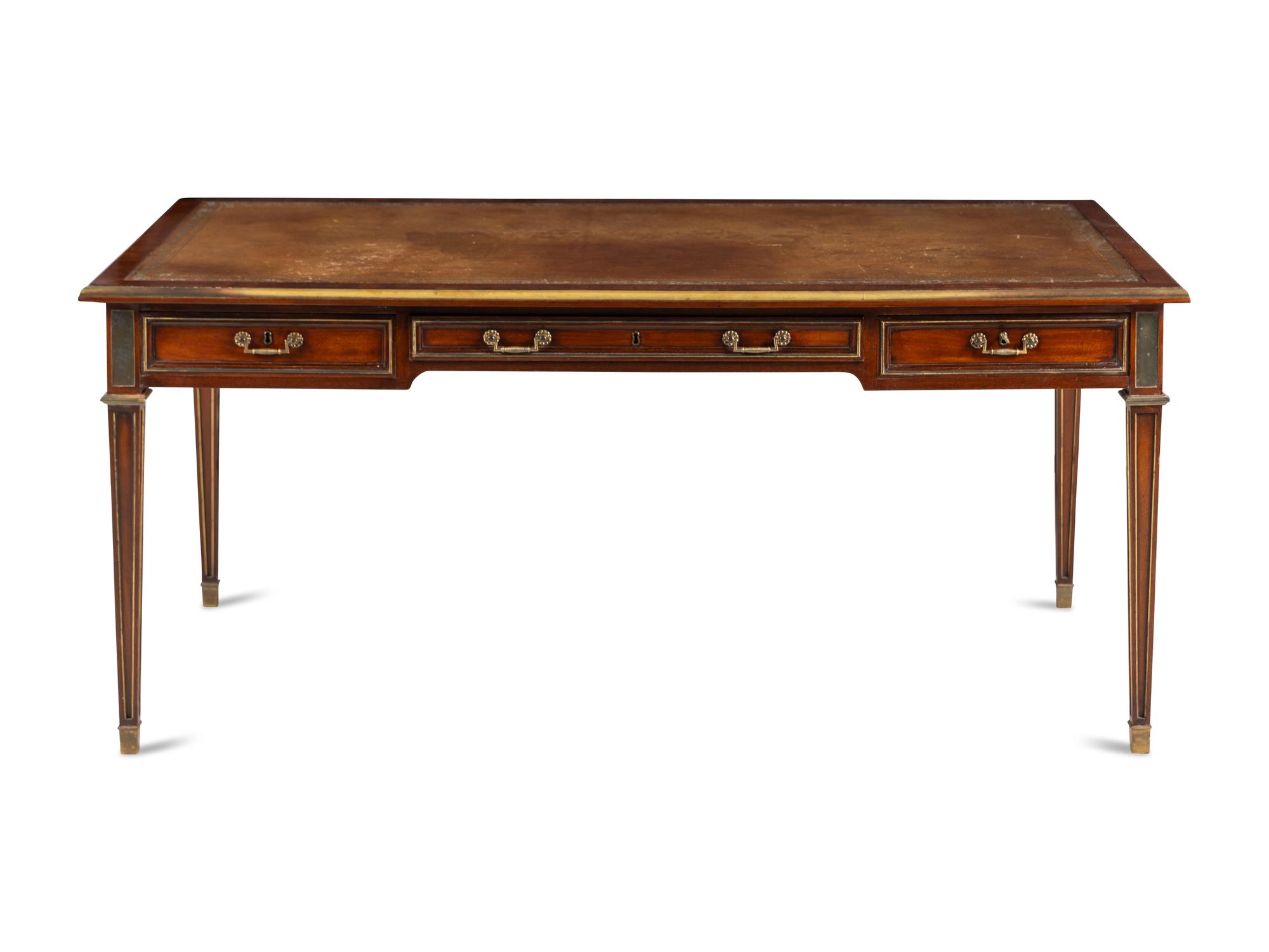 A Directoire Style Brass Mounted Mahogany Bureau Plat