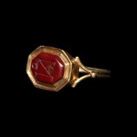 A Late Roman or Byzantine Red Jasper Intaglio with a Monogram — Set in a 19th Century gold ring
