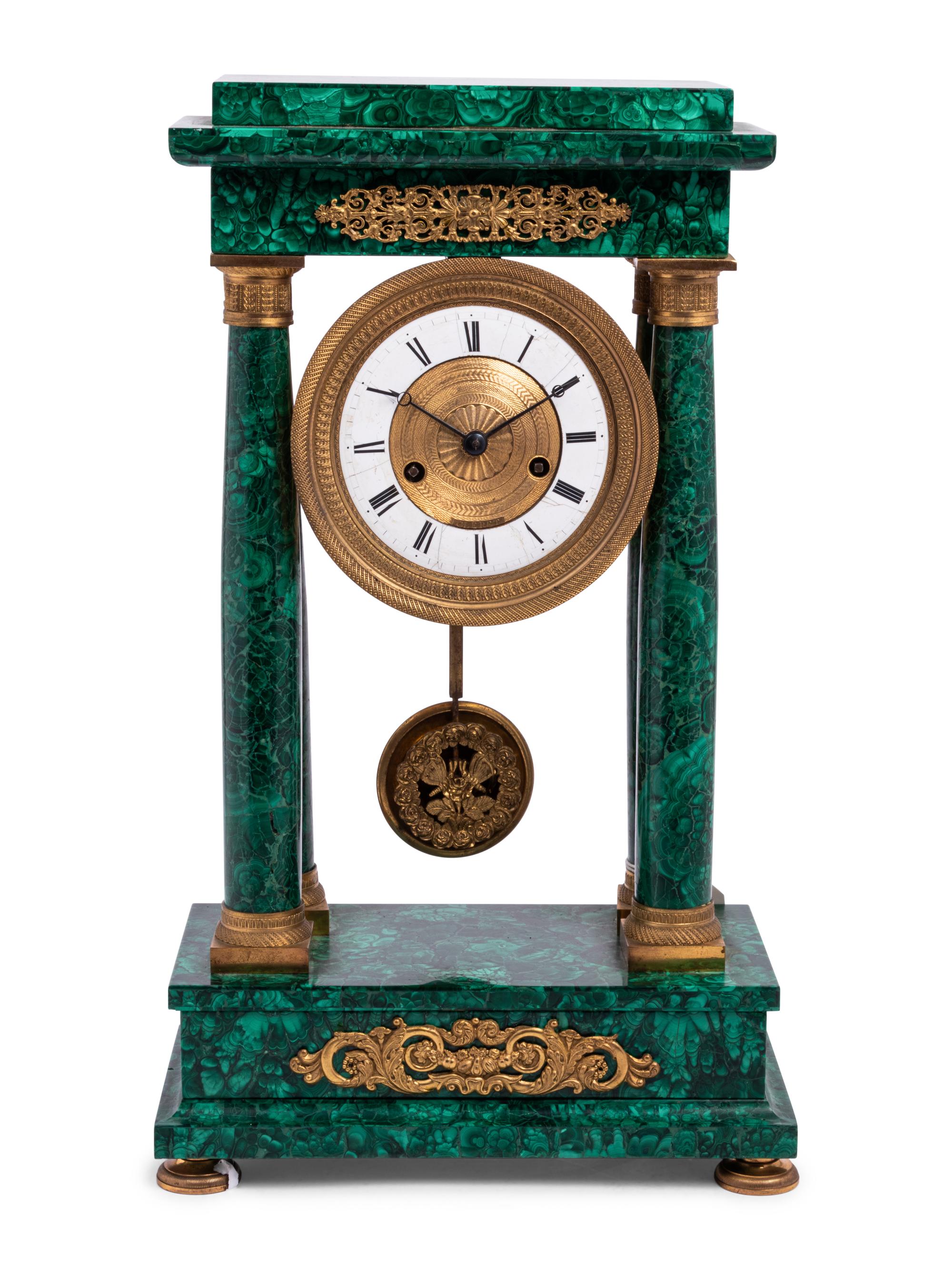A Continental Gilt Bronze Mounted Malachite Veneered Portico Clock