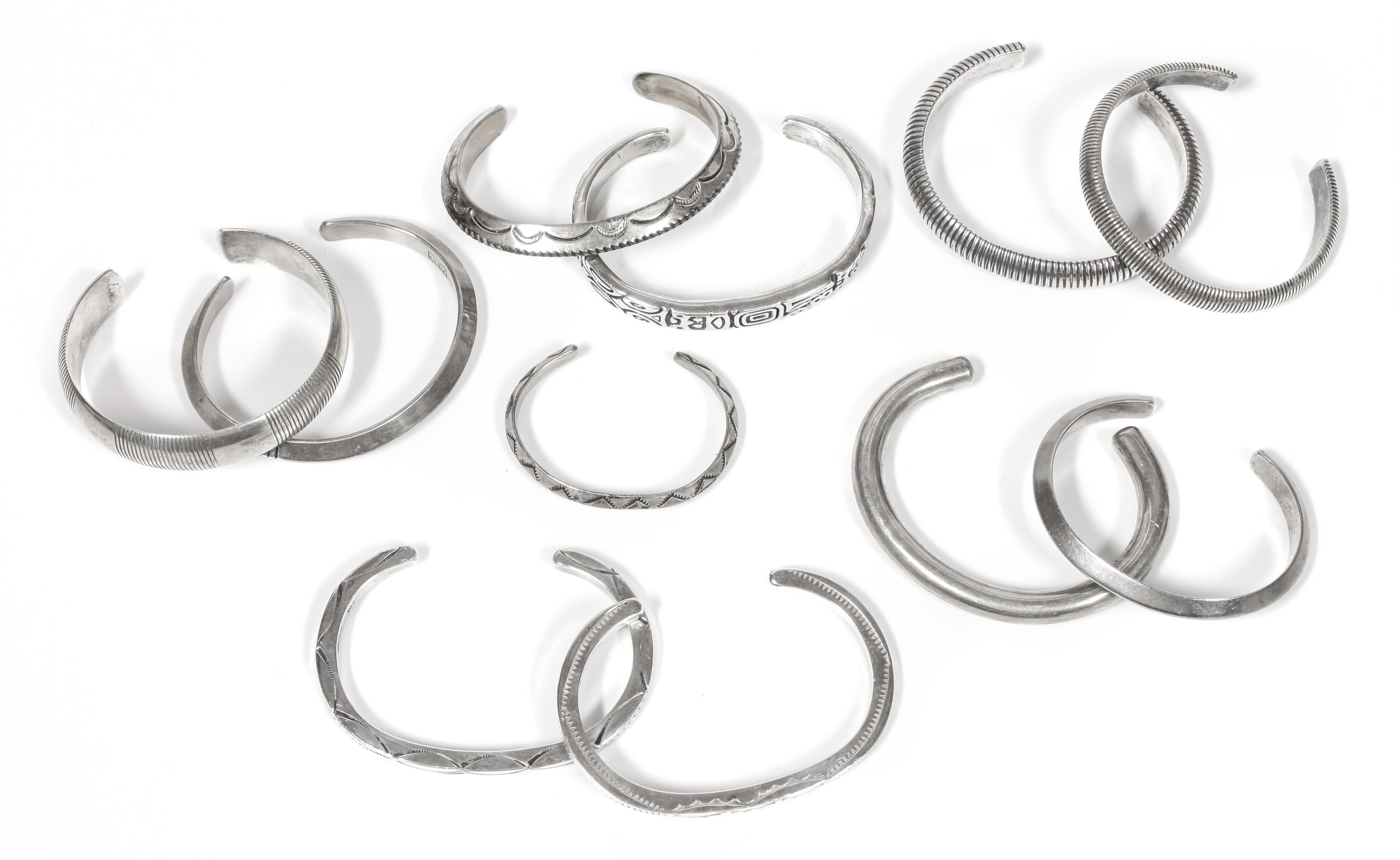 Collection of Southwestern Silver Guard Bracelets Length of one 5 x opening 1 x width 1/8 inches