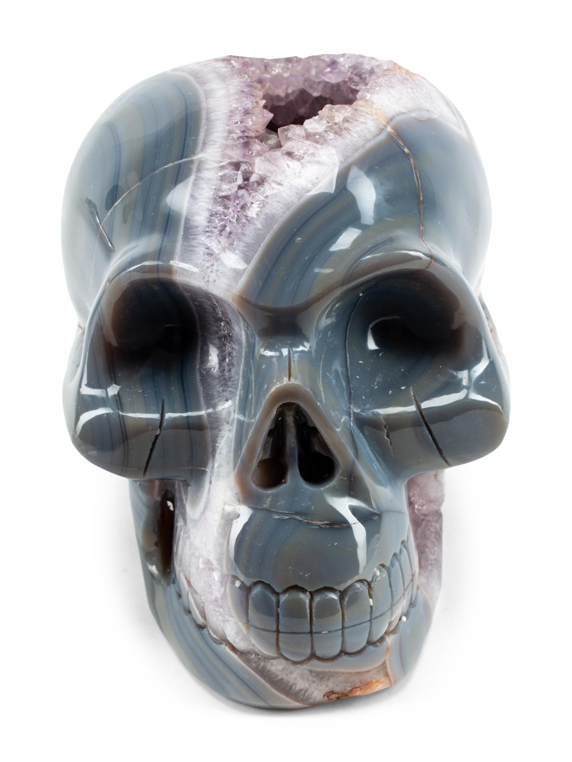 A Continental Carved Agate Geode Skull
