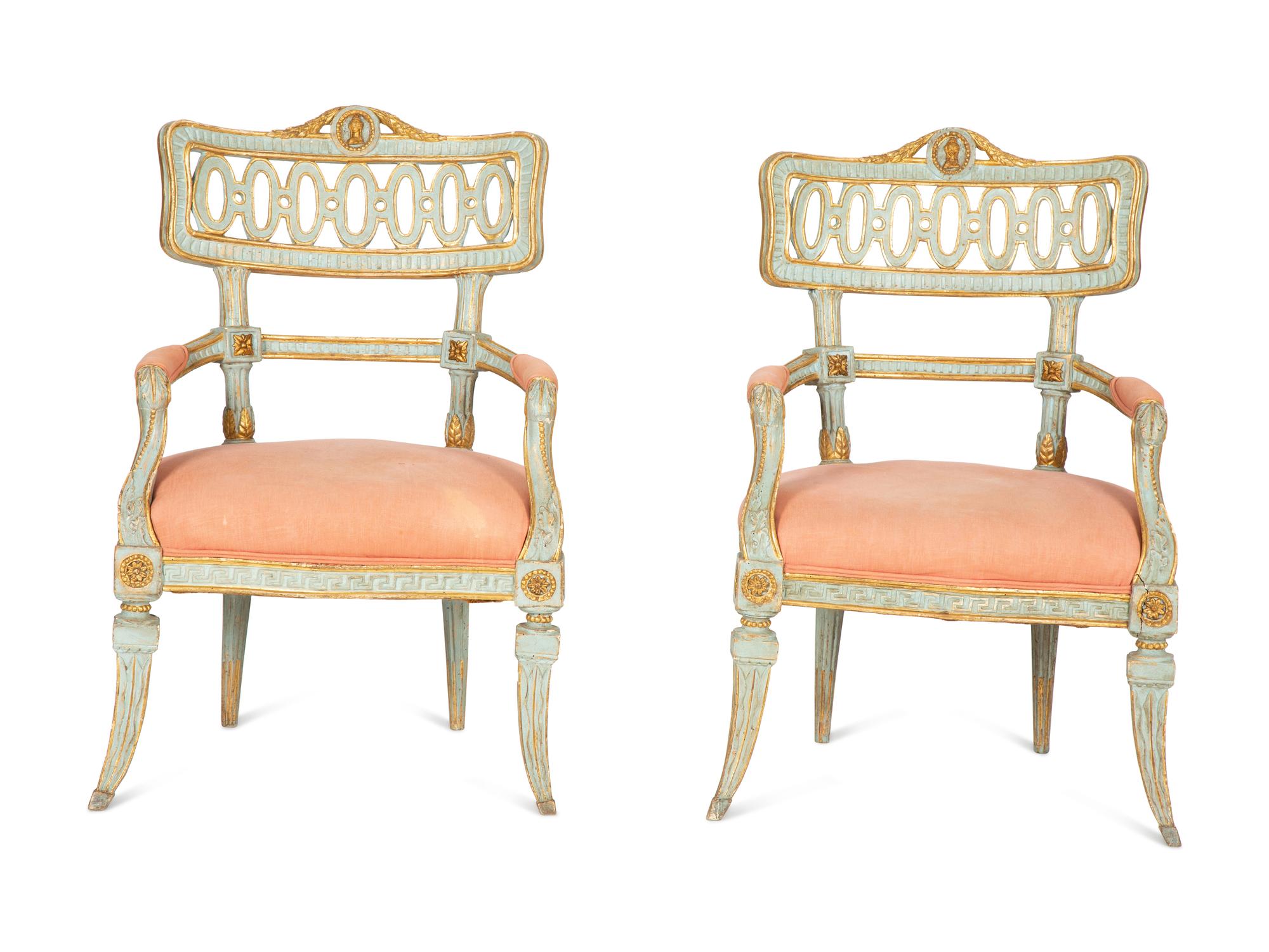 A Pair of Venetian Painted and Parcel Gilt Armchairs
