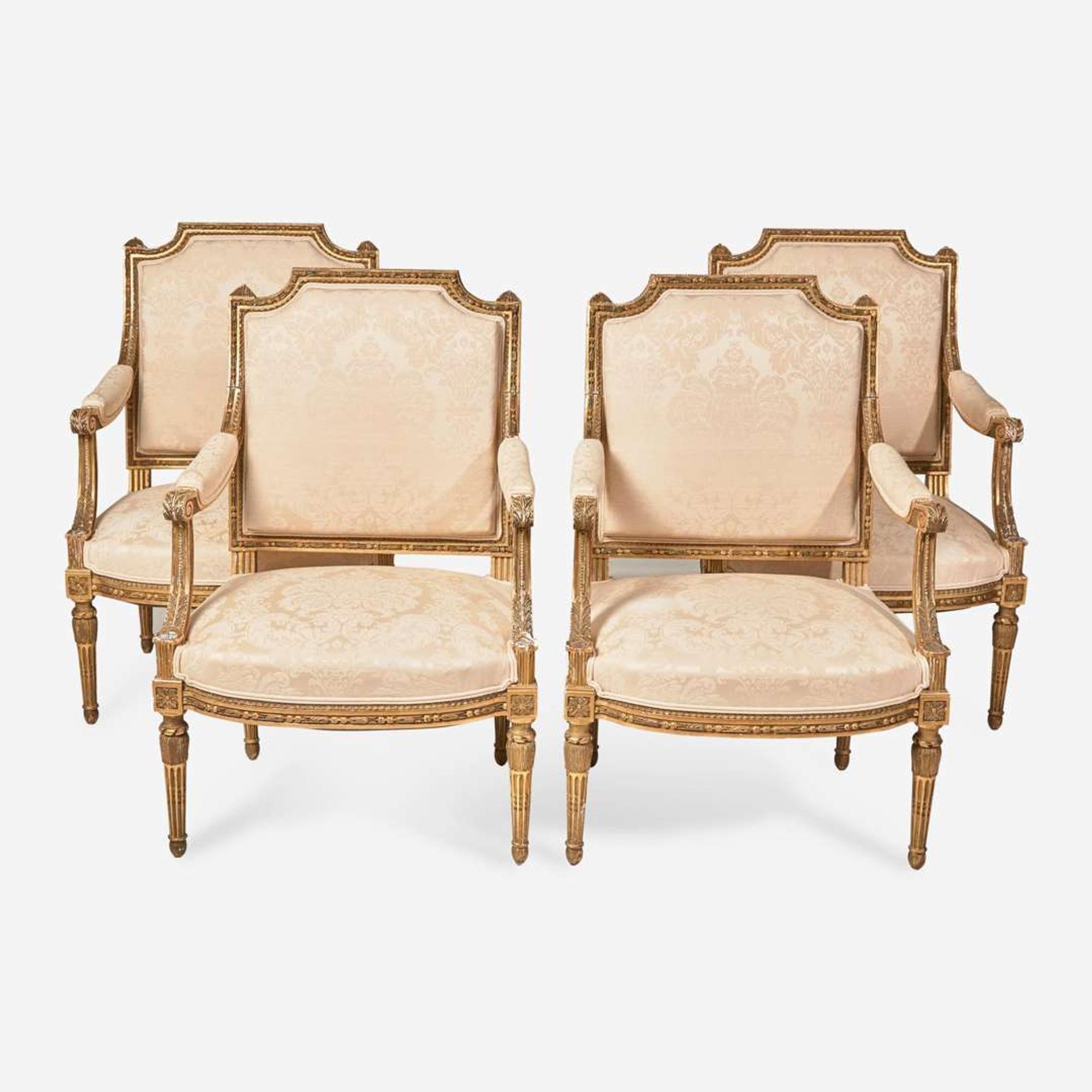 A set of four Louis XVI style giltwood fauteuils 19th century