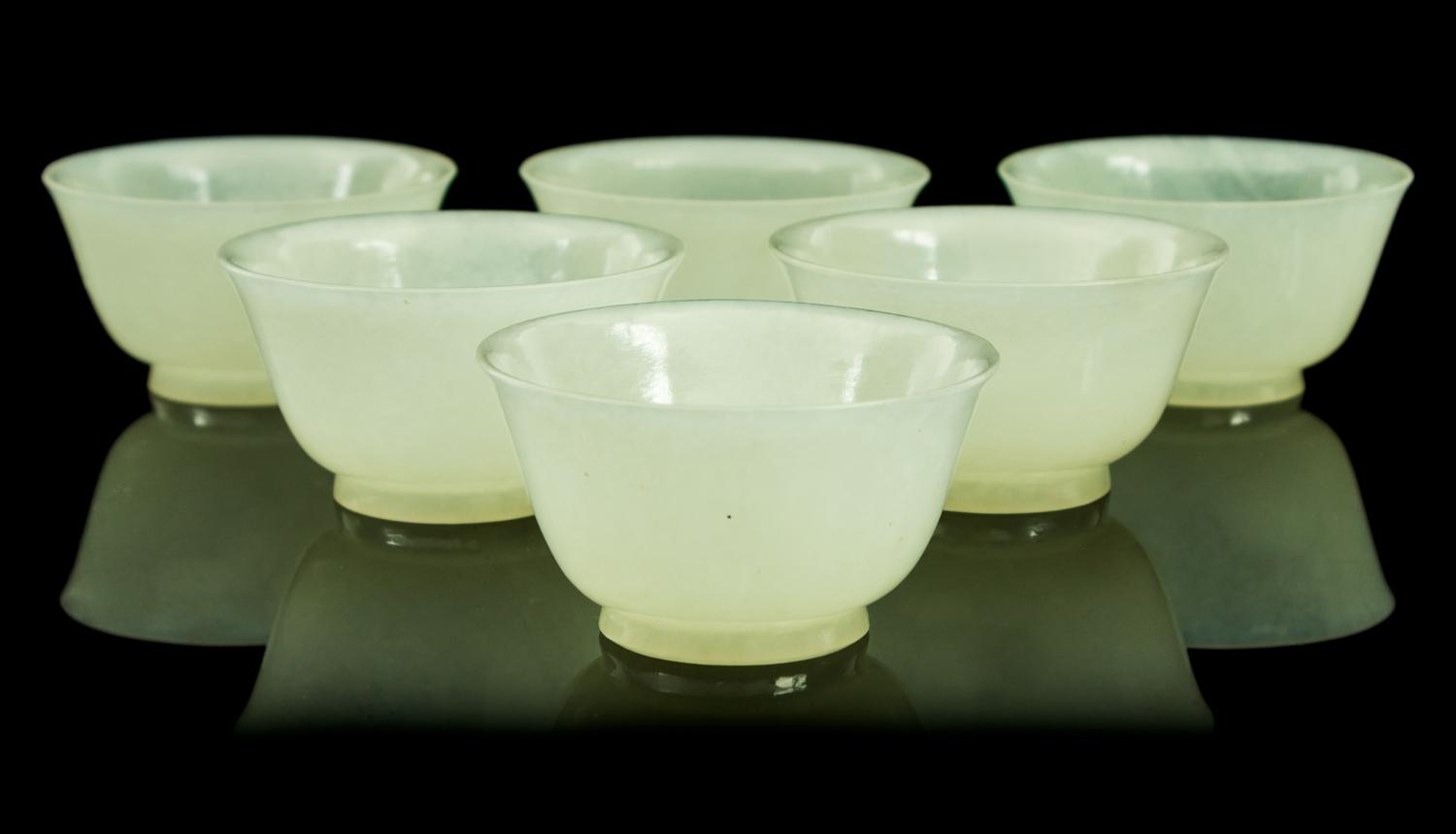 A Set of Six Jade Cups Diameter of each 2 1/4 inches.