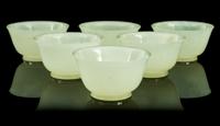 A Set of Six Jade Cups Diameter of each 2 1/4 inches.