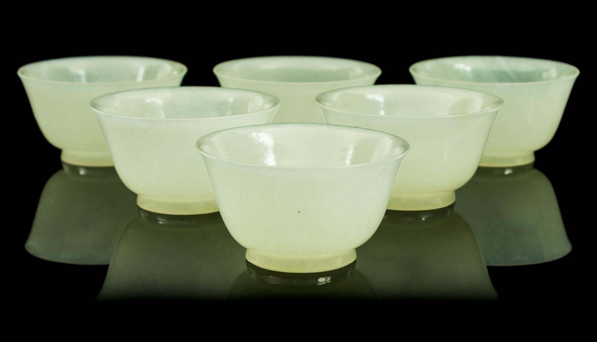 A Set of Six Jade Cups Diameter of each 2 1/4 inches.