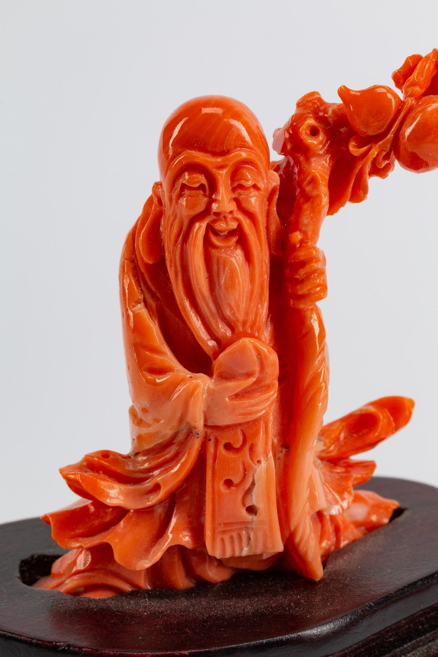 Four Chinese Carved Coral Figures