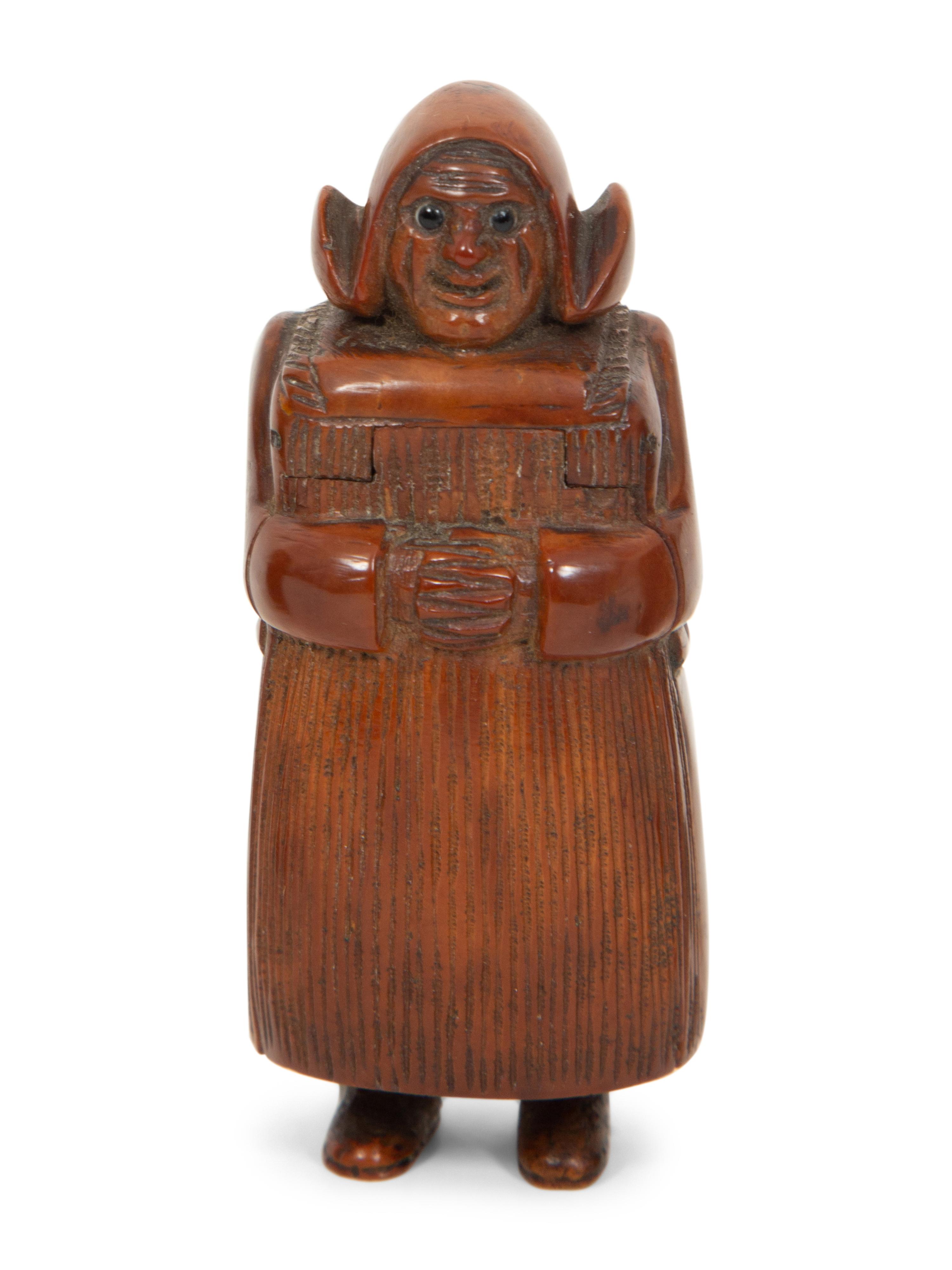 A Scottish Mauchline Ware Table Snuff Box, a French Pressed Wood Box and a Carved Dutch Girl Figural Snuff Box