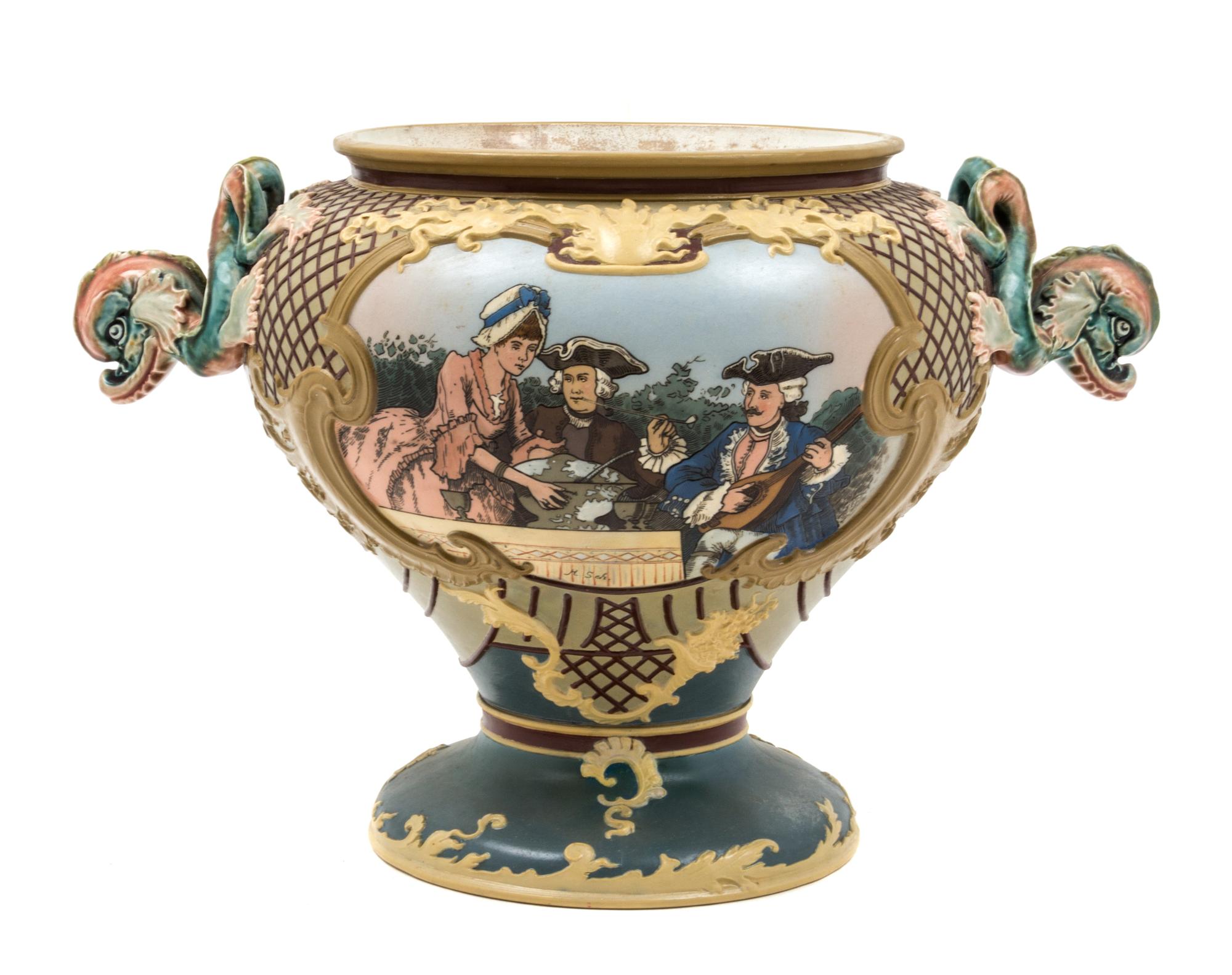 A Mettlach Stoneware Center Bowl Height 11 1/2 inches.