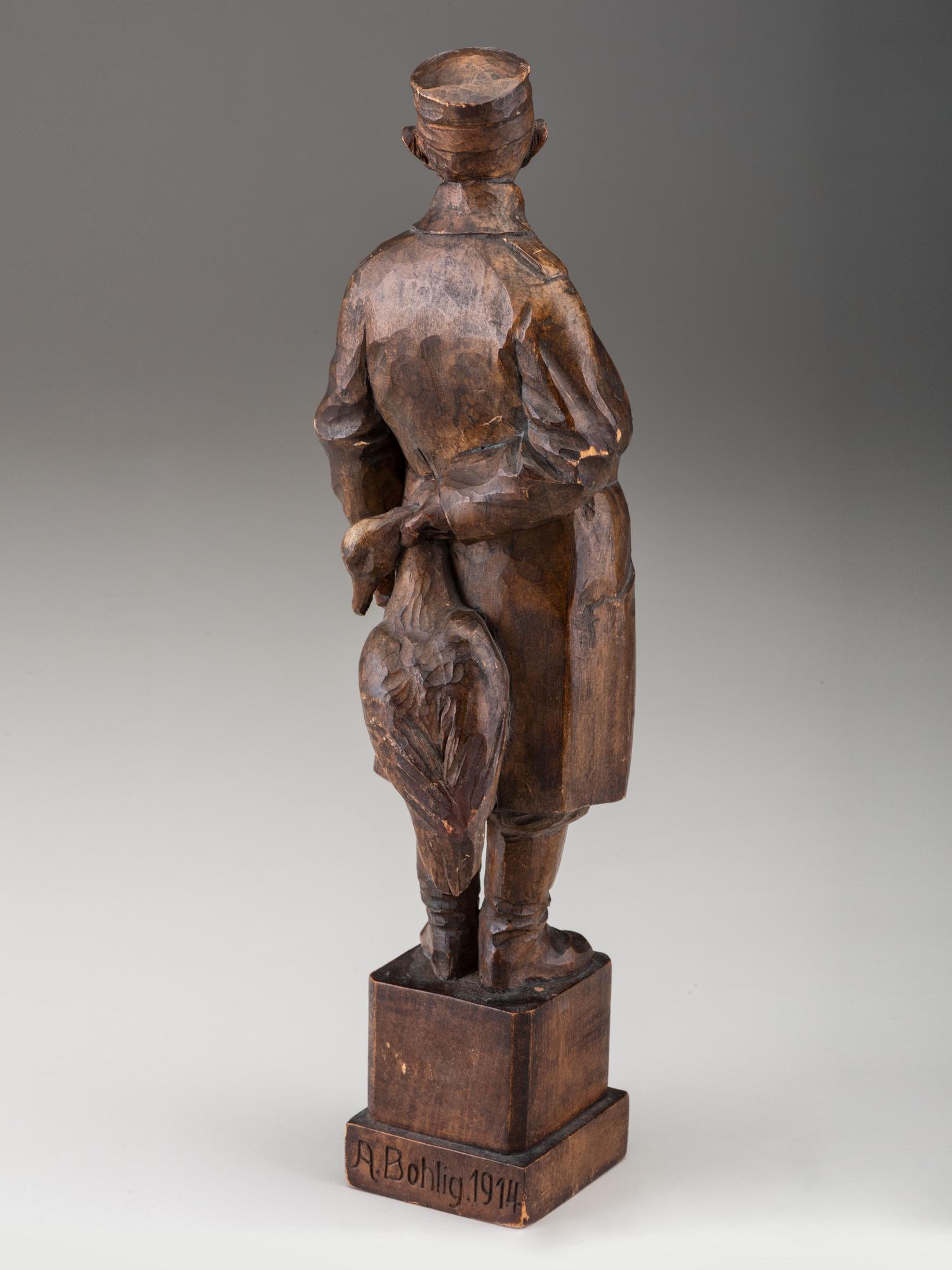 A German Carved Wood Figure of a Duck Hunter
