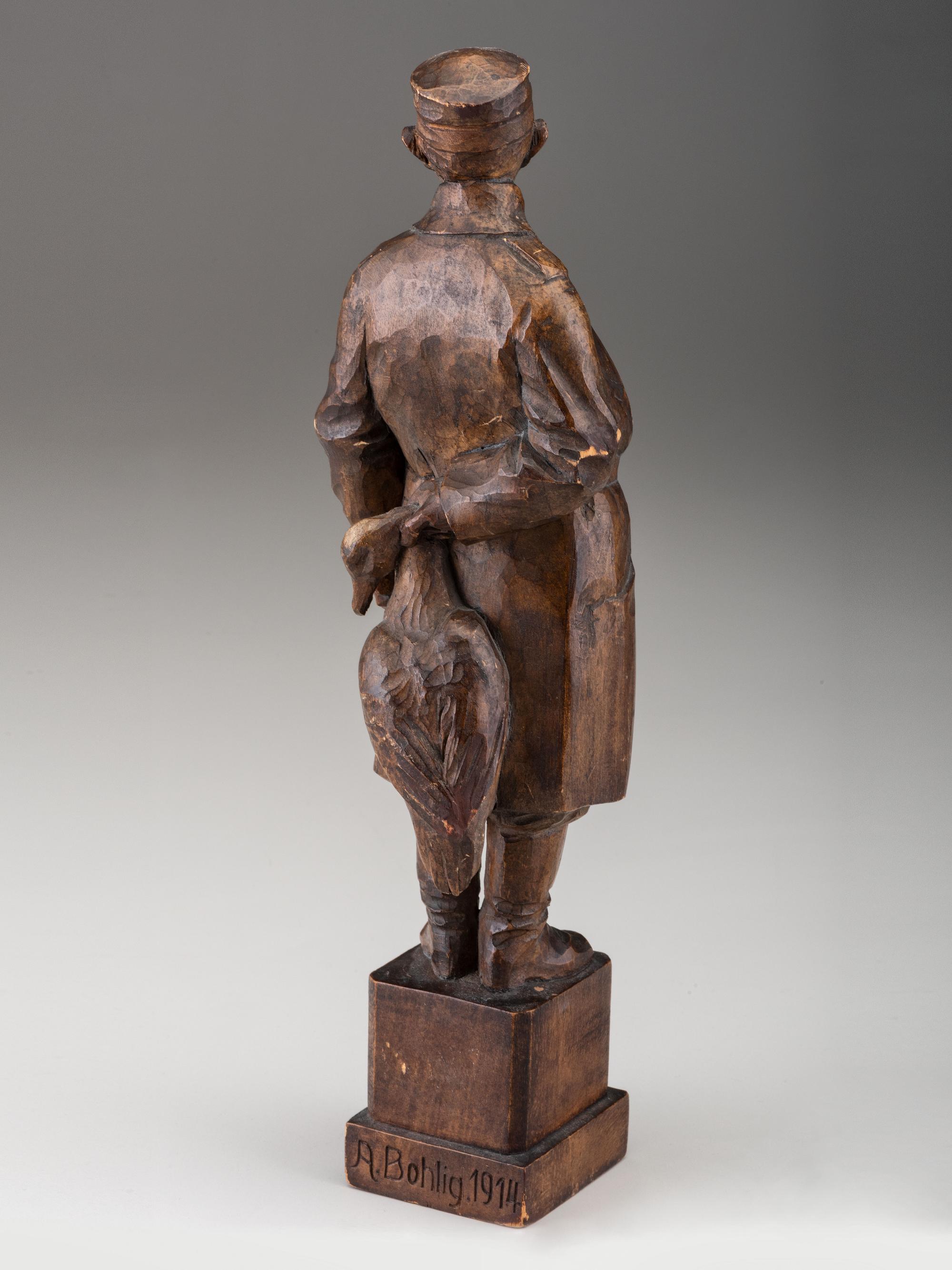 A German Carved Wood Figure of a Duck Hunter