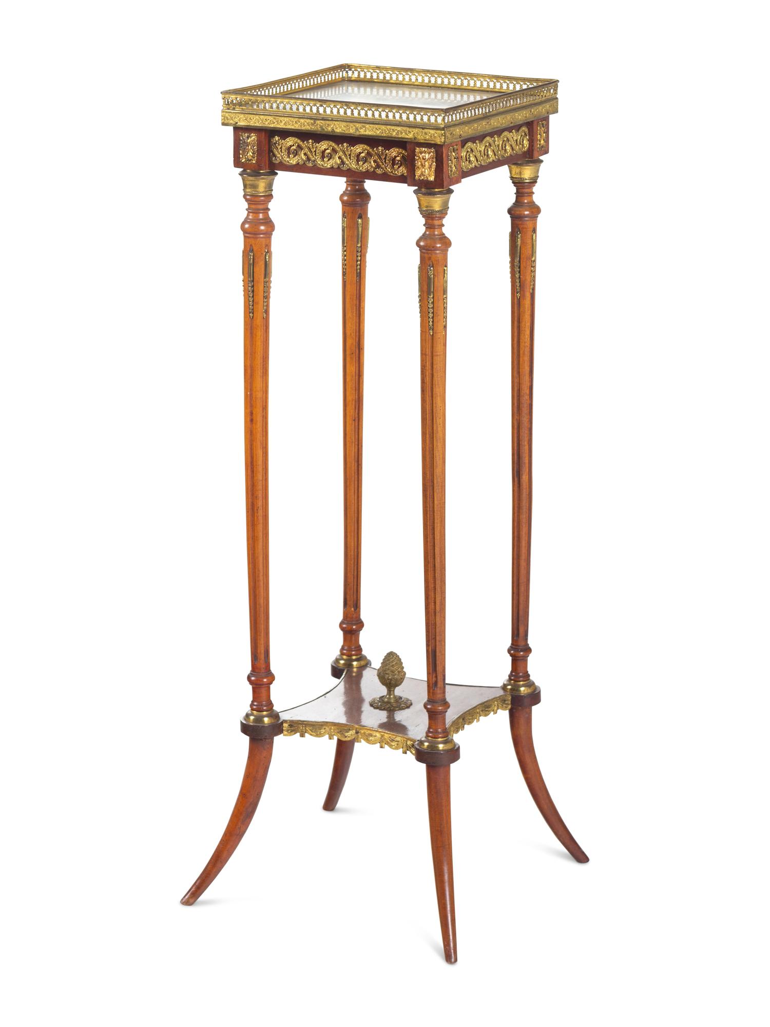 A Louis XVI Style Gilt Metal Mounted Onyx-Top Pedestal Table