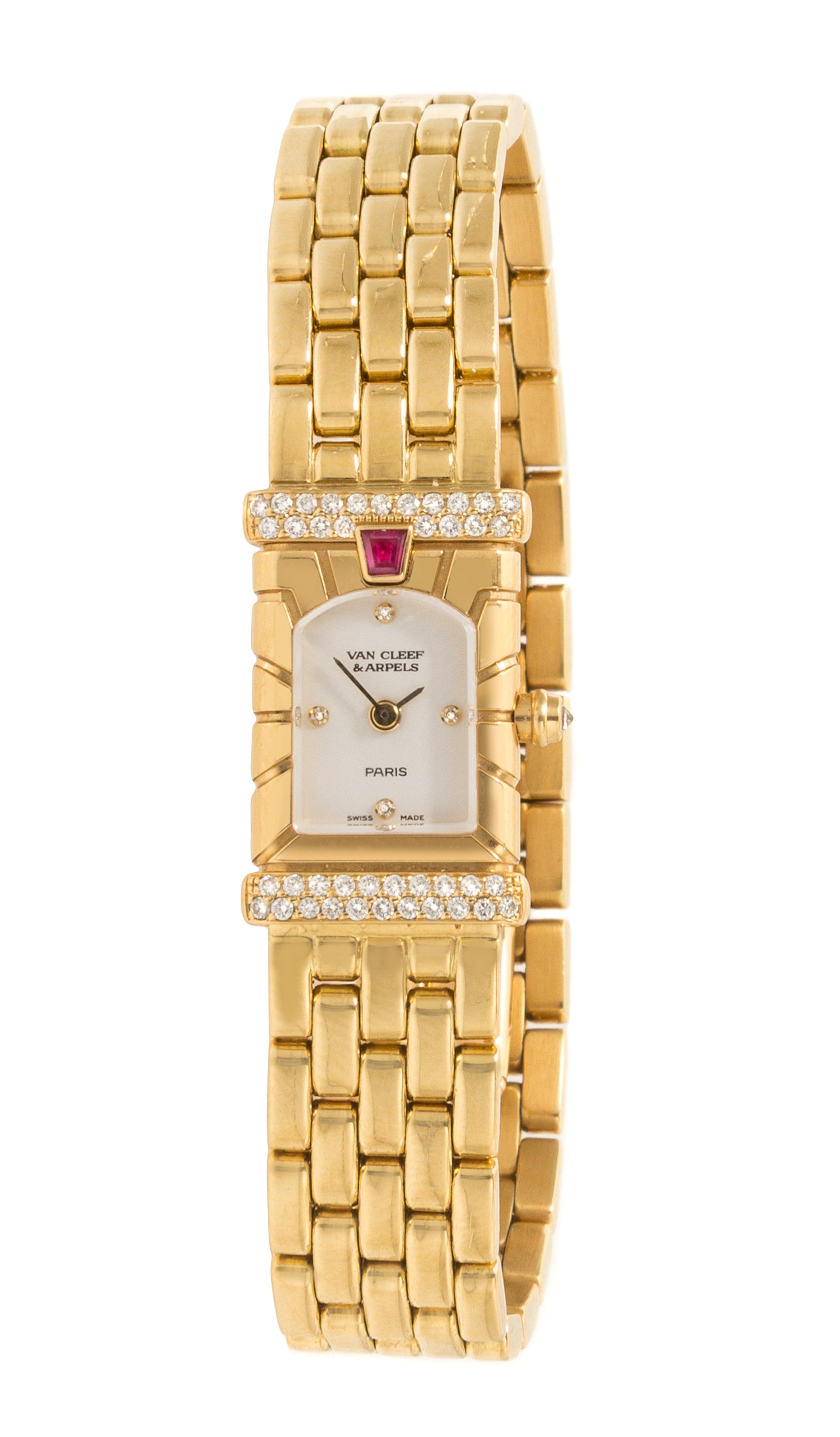 An 18 Karat Yellow Gold, Diamond and Ruby Facade Wristwatch, Van Cleef & Arpels,