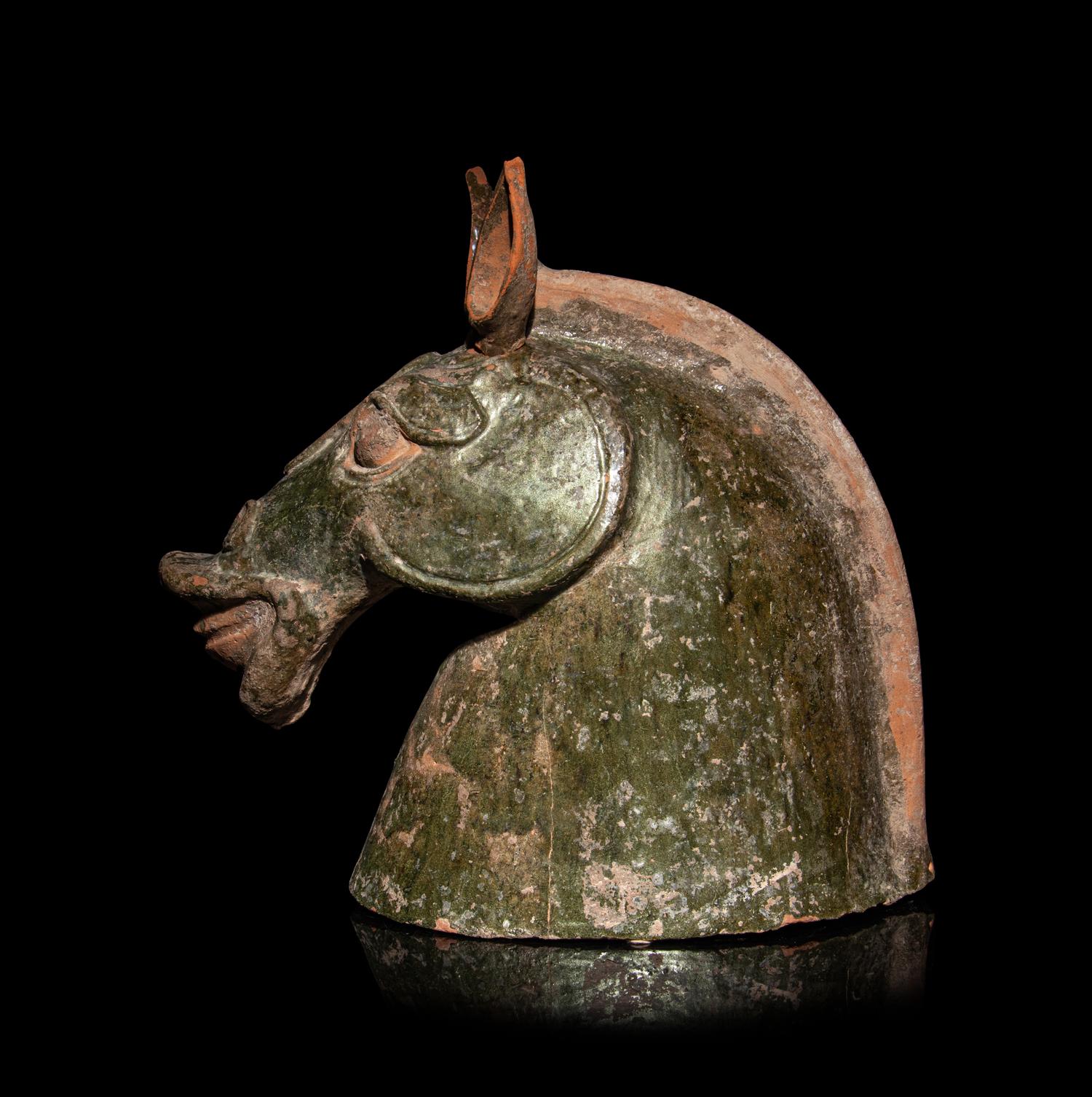 Three Chinese Pottery Equine Figures