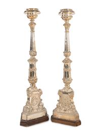 A Pair of Monumental Silvered Metal Altar Sticks