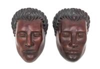 Art Deco, FIRST HALF 20TH CENTURY, a pair of masks