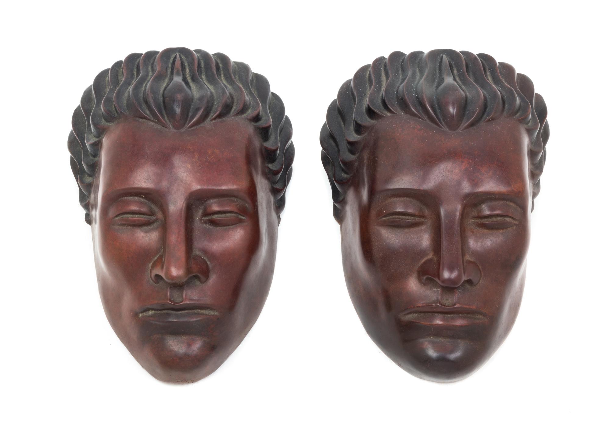 Art Deco, FIRST HALF 20TH CENTURY, a pair of masks