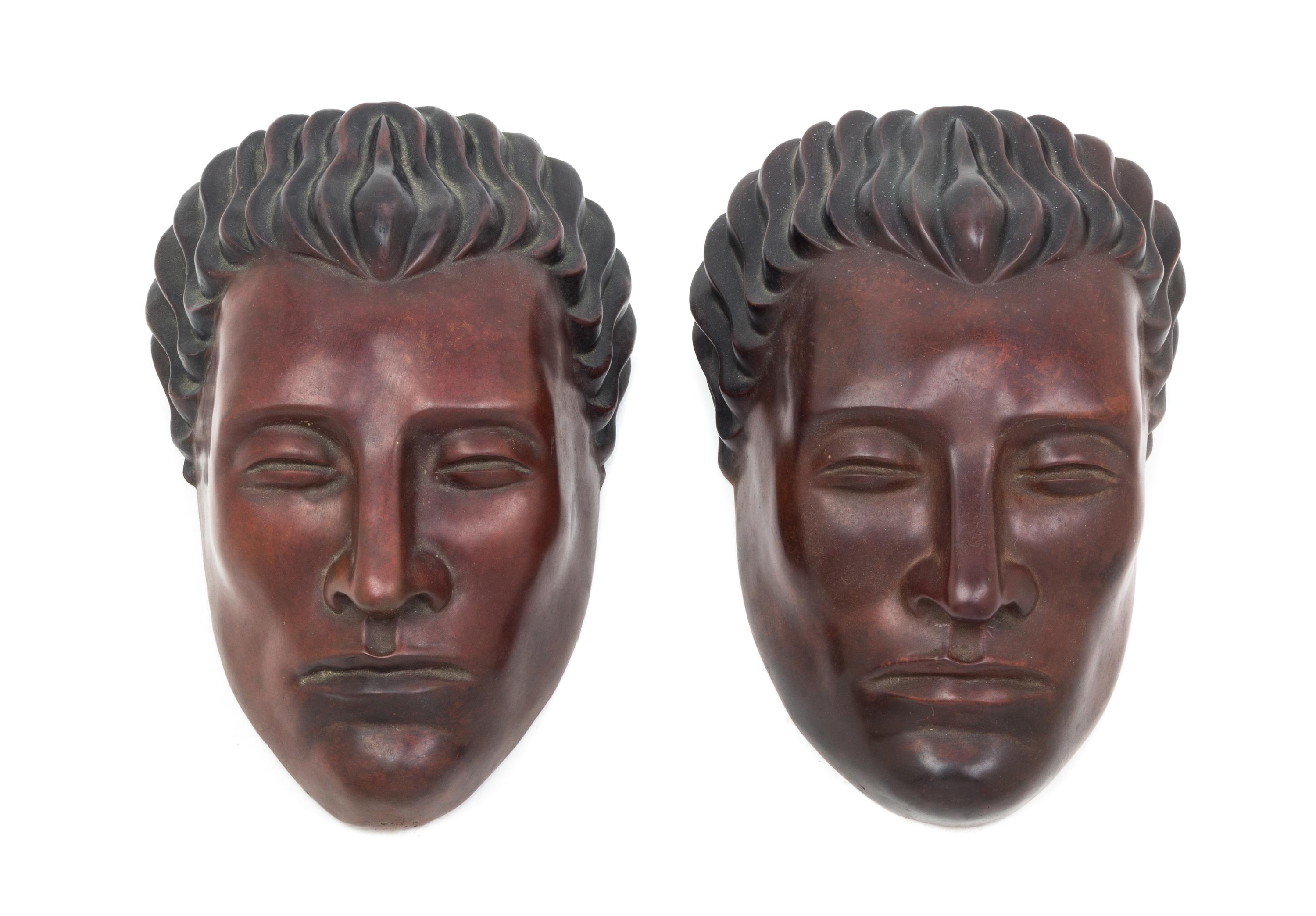 Art Deco, FIRST HALF 20TH CENTURY, a pair of masks