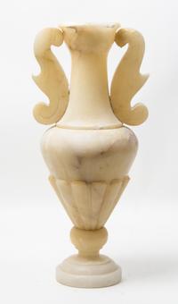 A Carved Stone Urn Height 22 1/2 inches.