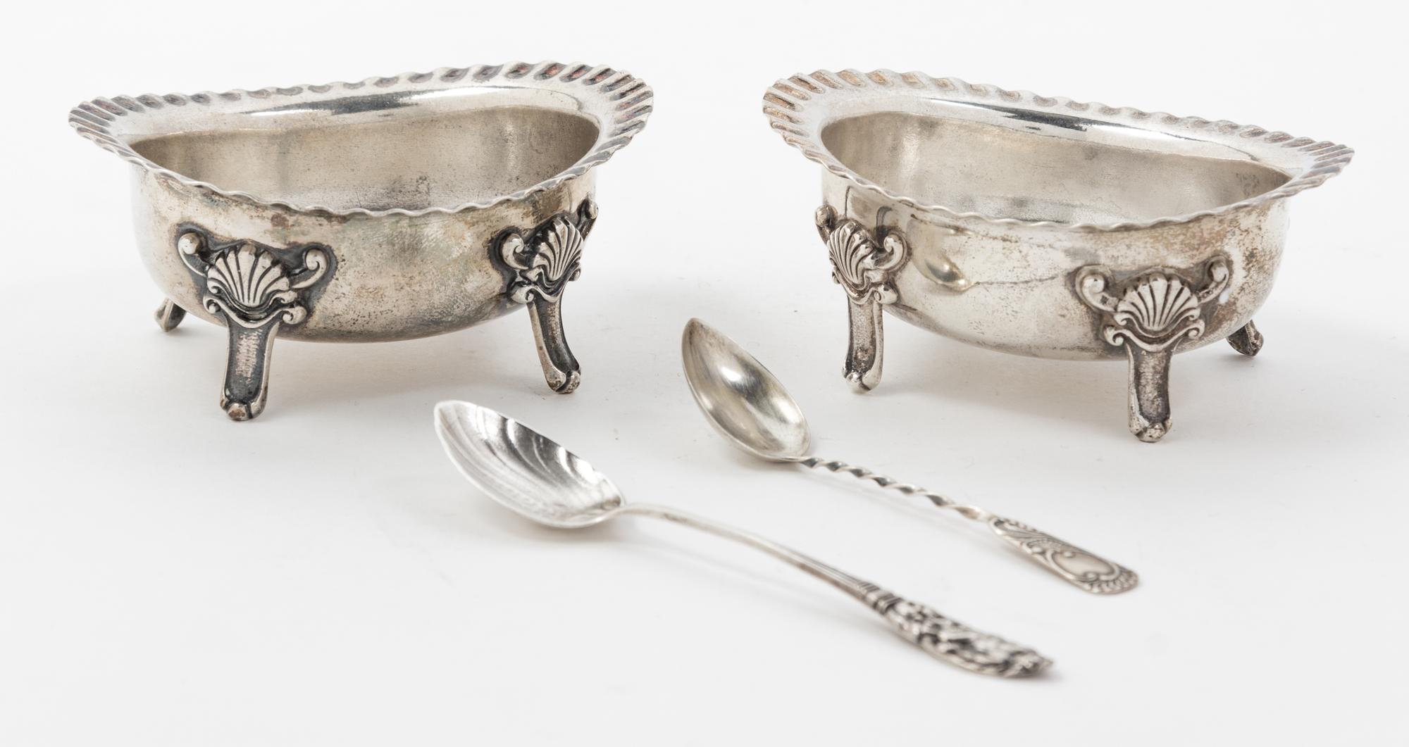 A Pair of American Silver Castors, Gorham Mfg. Co., Providence, RI, of ovoid form with scalloped rim and raised on four feet