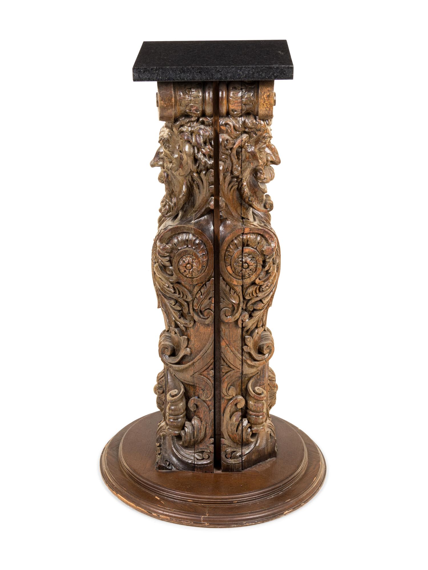A Continental Carved Oak Pedestal
