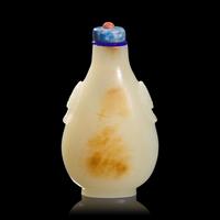 A Chinese Carved White and Russet Jade Snuff Bottle