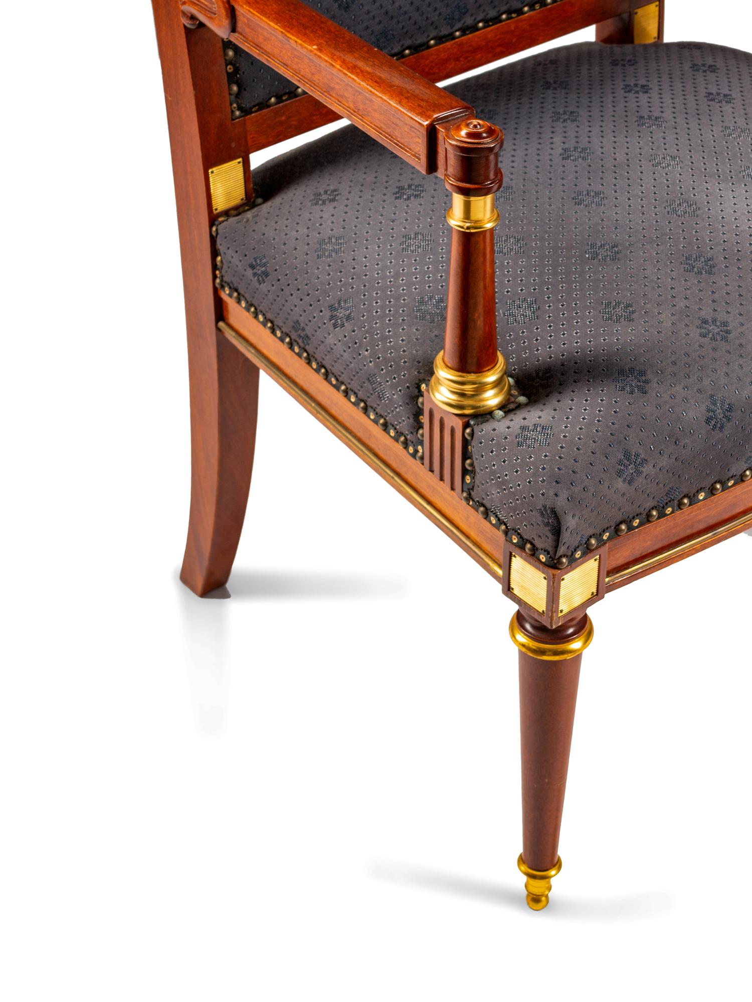 A Baltic Neoclassical Style Mahogany Desk and Chair