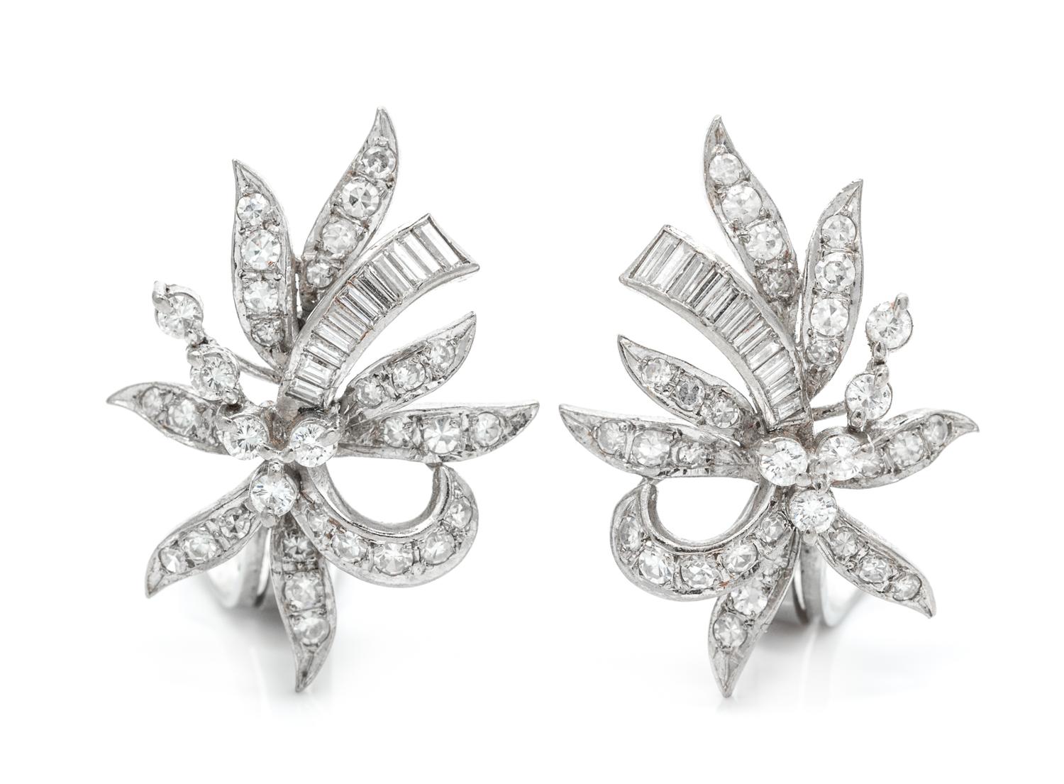 A Pair of Platinum and Diamond Spray Earclips, 6.25 dwts.