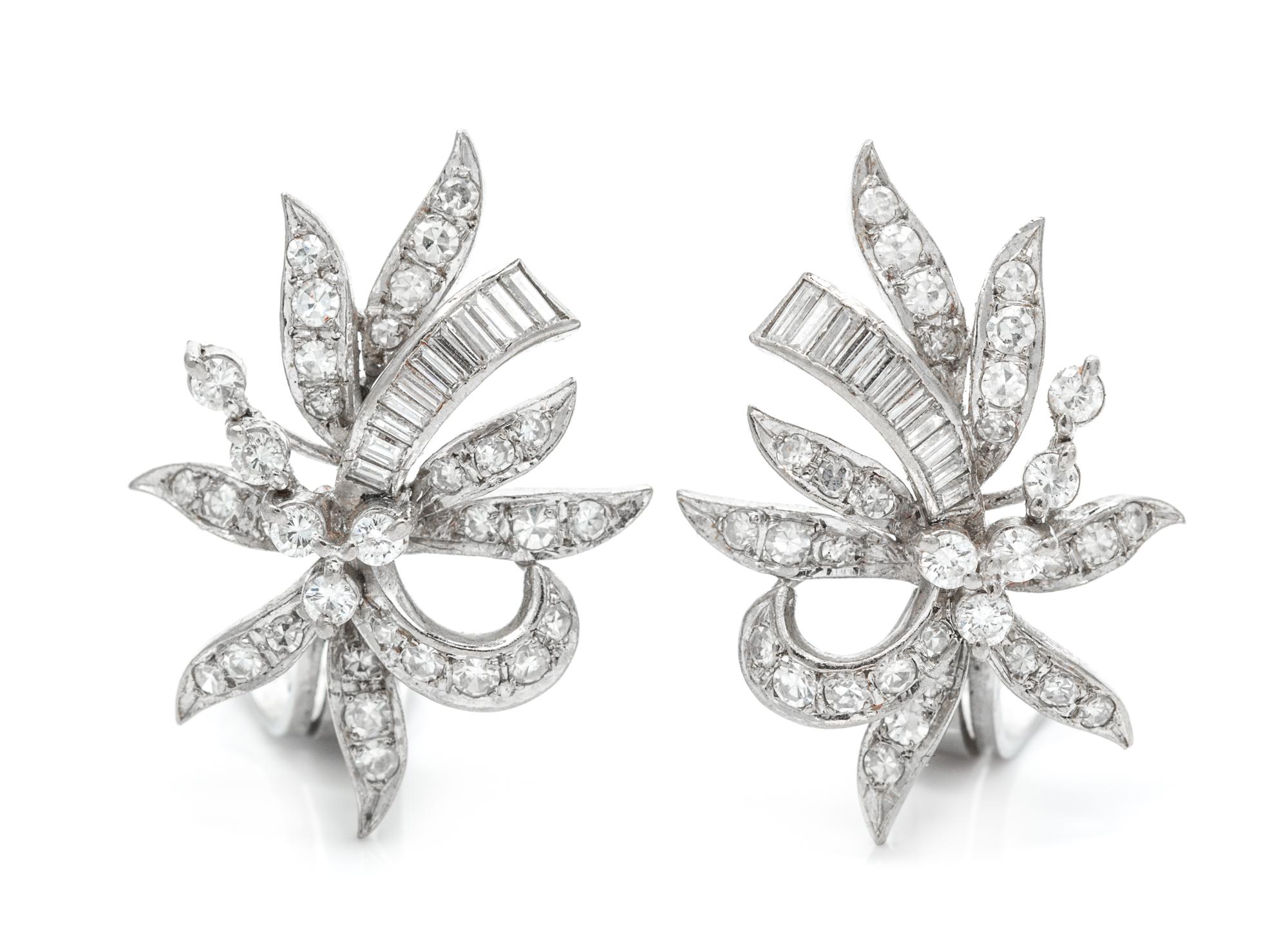 A Pair of Platinum and Diamond Spray Earclips, 6.25 dwts.