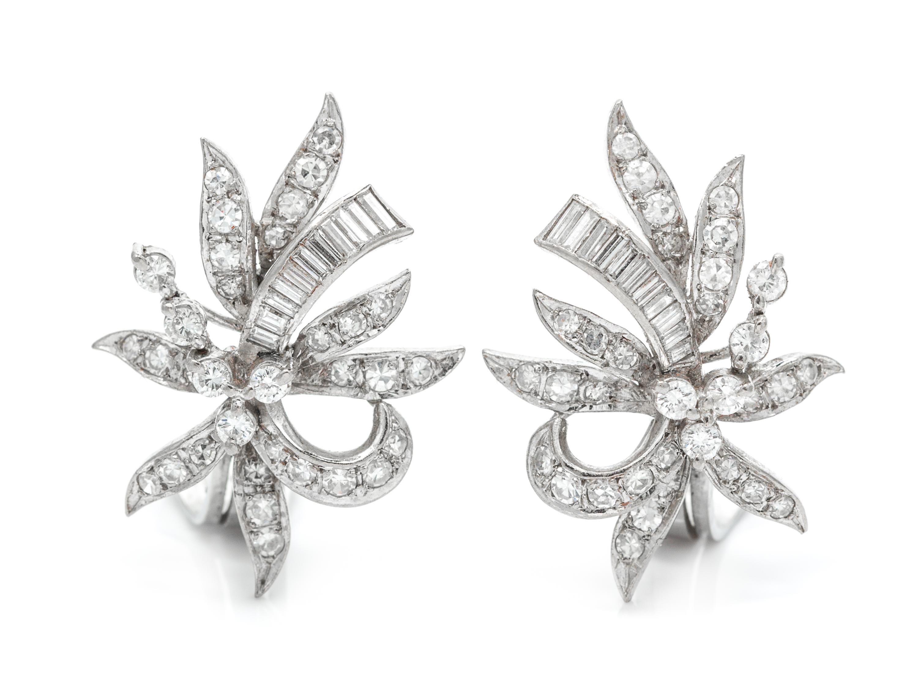 A Pair of Platinum and Diamond Spray Earclips, 6.25 dwts.