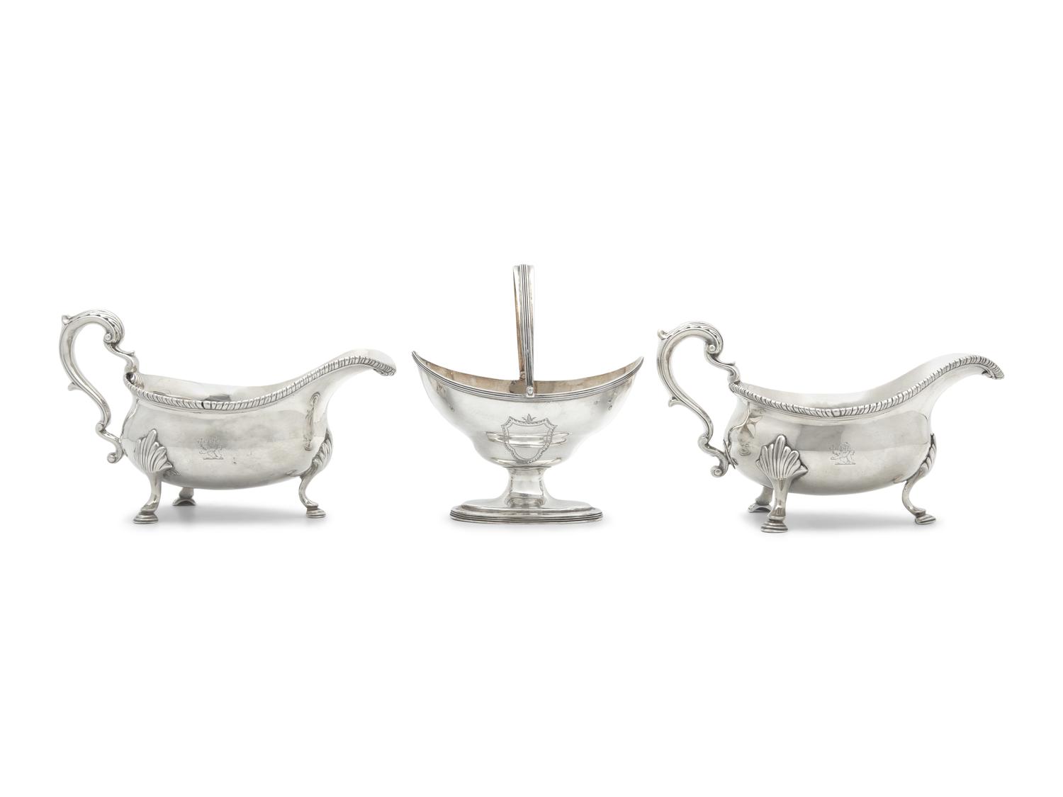 A Pair of Large George III Silver Sauce Boats Together With Sugar Basket