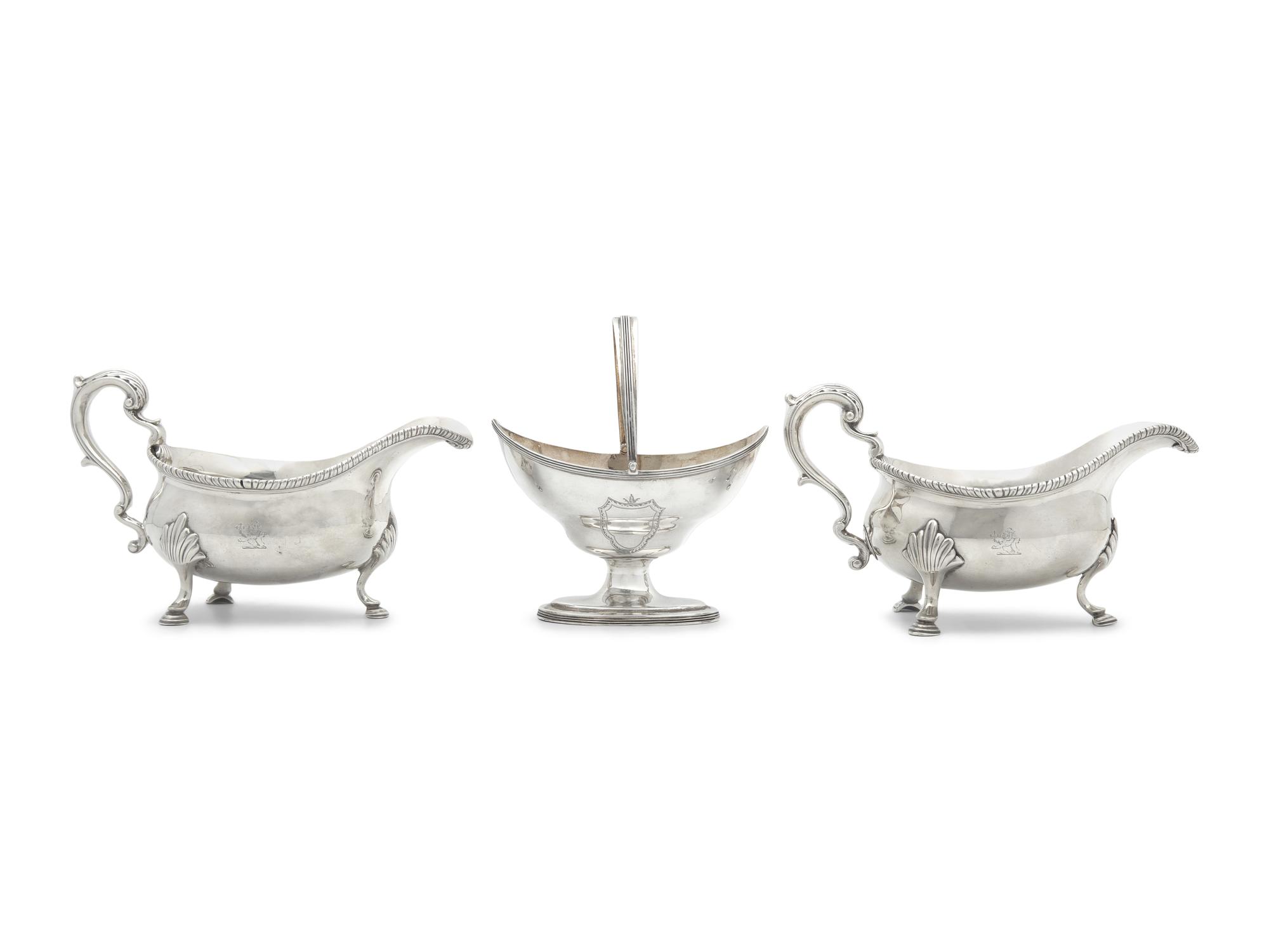 A Pair of Large George III Silver Sauce Boats Together With Sugar Basket