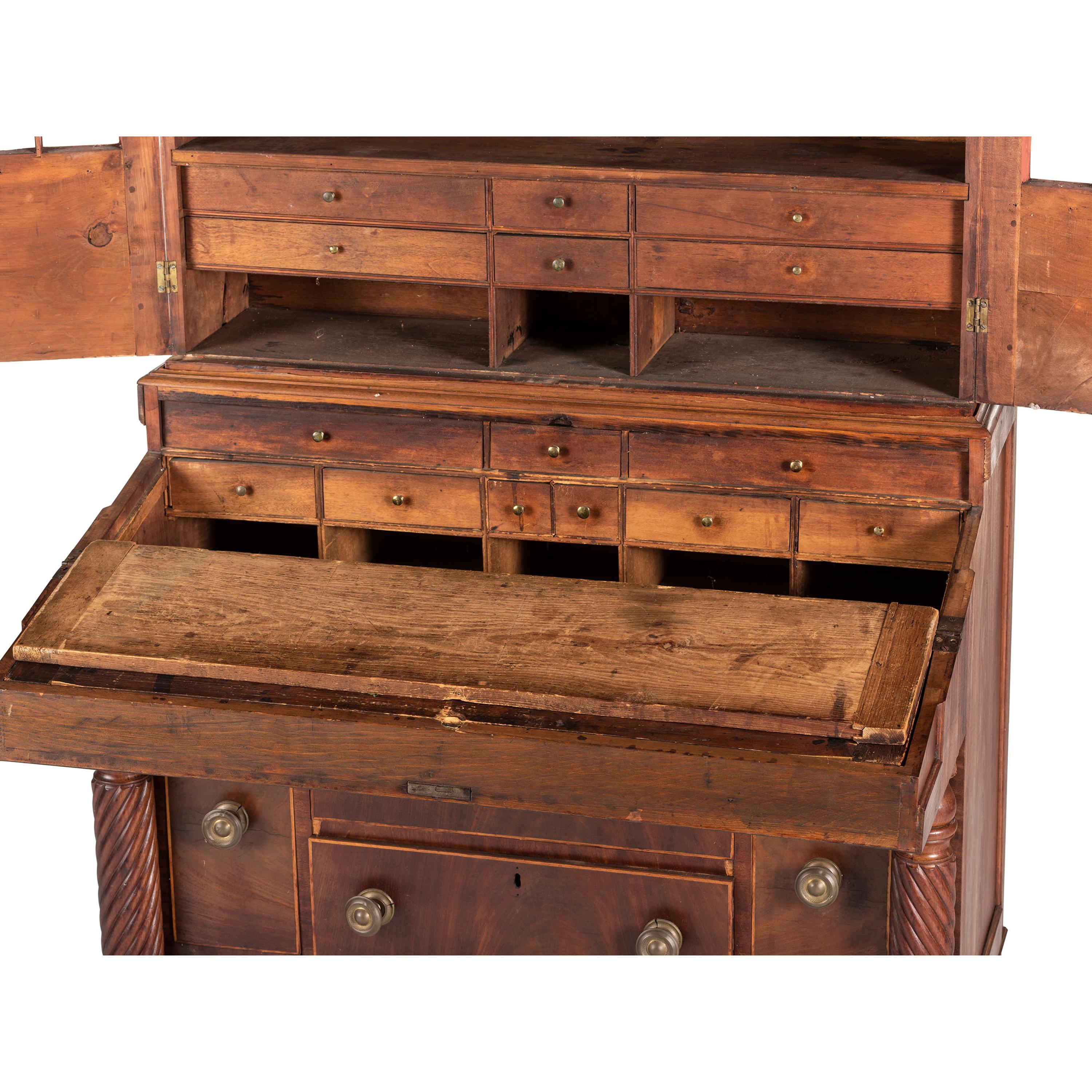 A Classical Figured Maple and Mahogany Desk-and-Bookcase