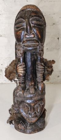 An African Carved Wood Figure. Height of 21 1/2 inches.