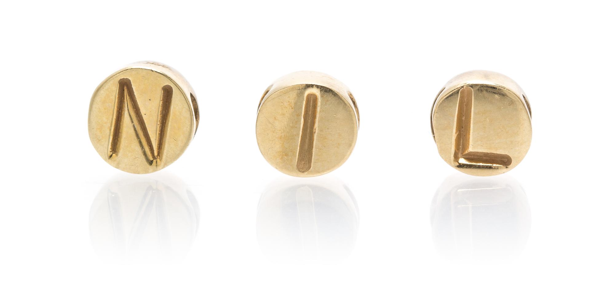 A Collection of 14 Karat Yellow Gold Letter Beads, 2.50 dwts.