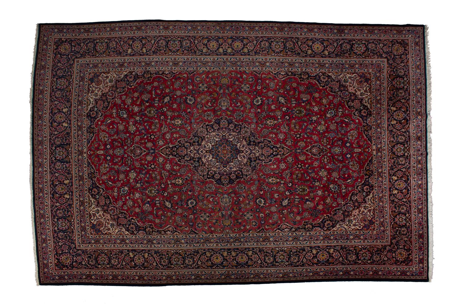 A Tabriz Wool Rug — 20TH CENTURY