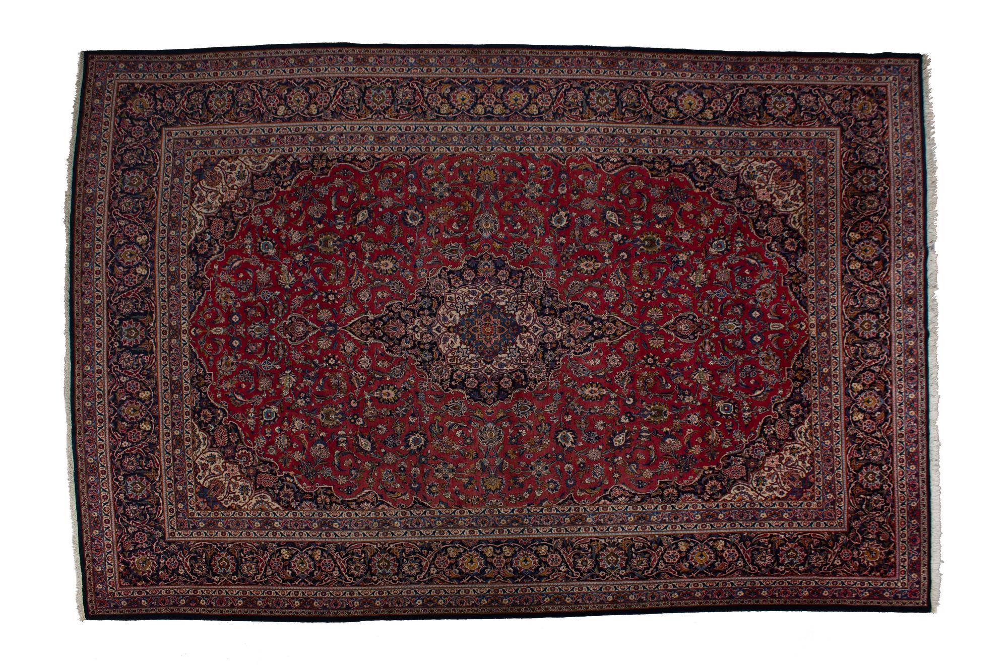 A Tabriz Wool Rug — 20TH CENTURY