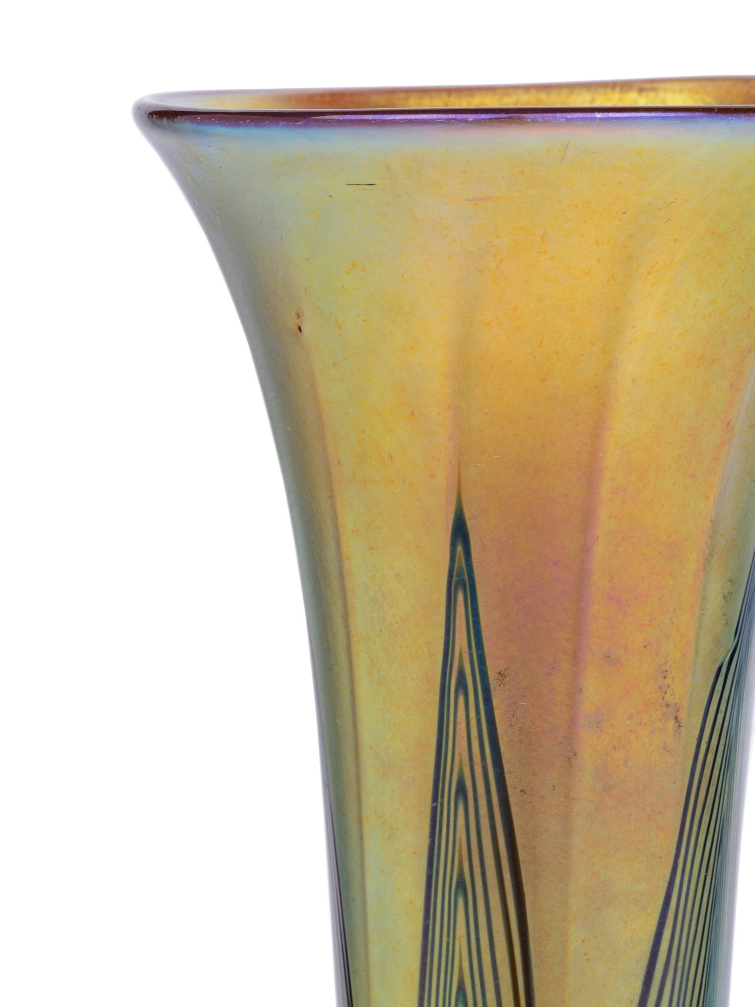 A Lundberg Studios Iridescent Glass and Patinated Bronze Vase