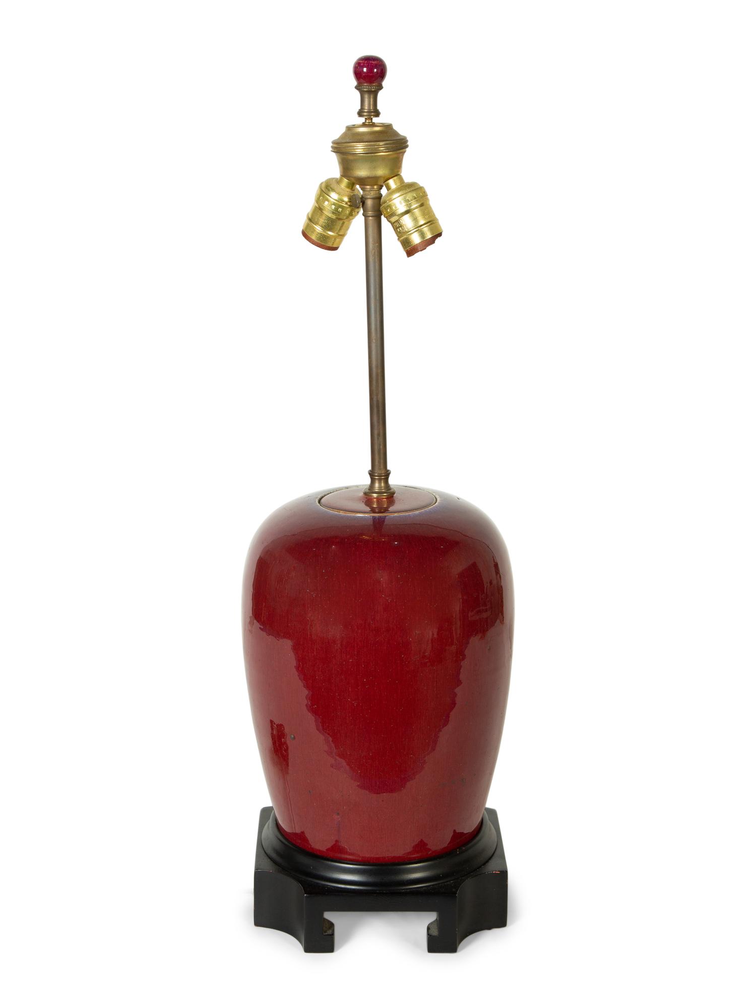 An Iron Red-Glazed Porcelain Jar Mounted as a Lamp