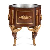 An Empire Style Gilt-Bronze Mounted Mahogany Jardinière