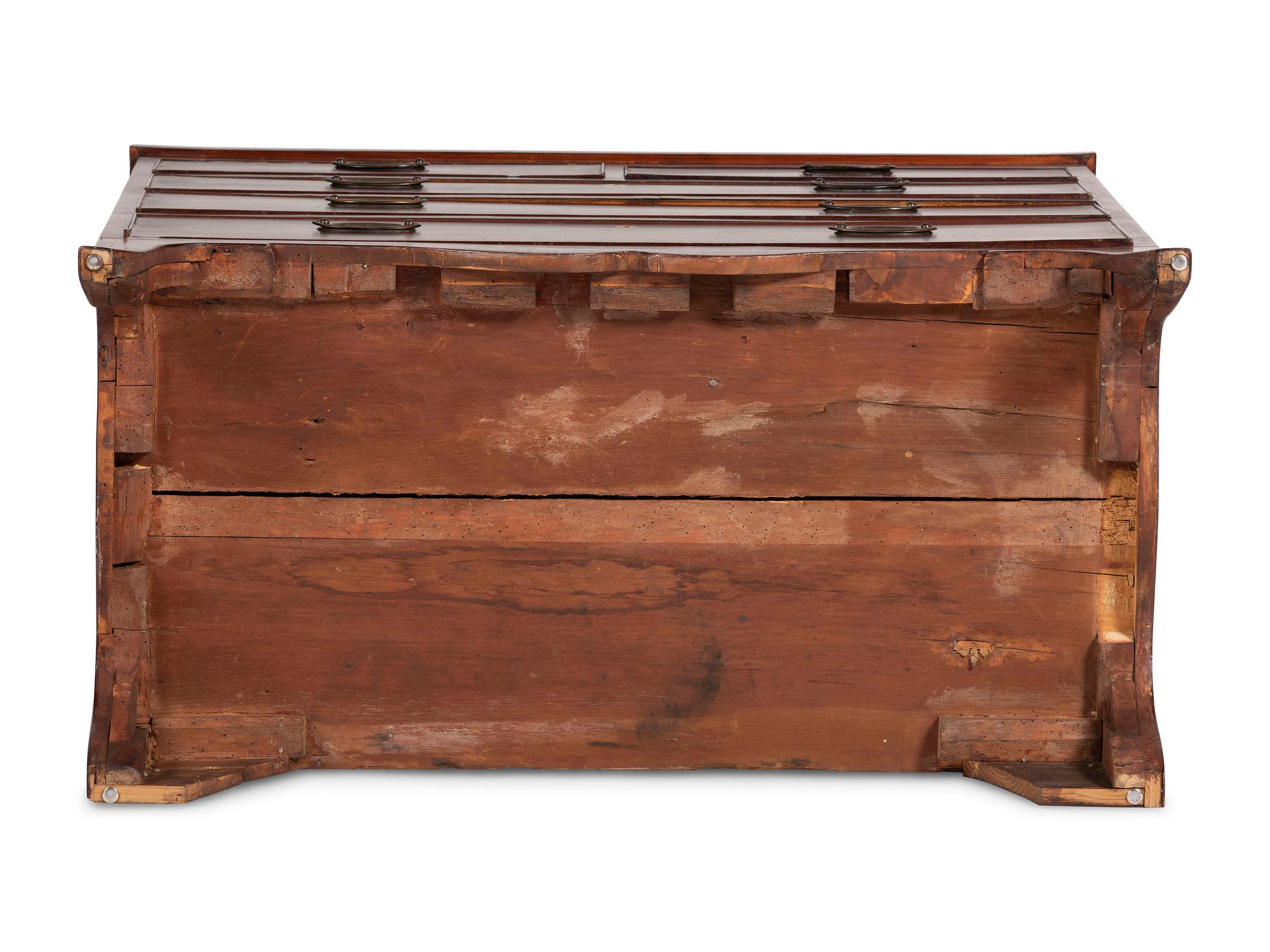 A Federal Inlaid and Veneered Mahogany Chest of Drawers