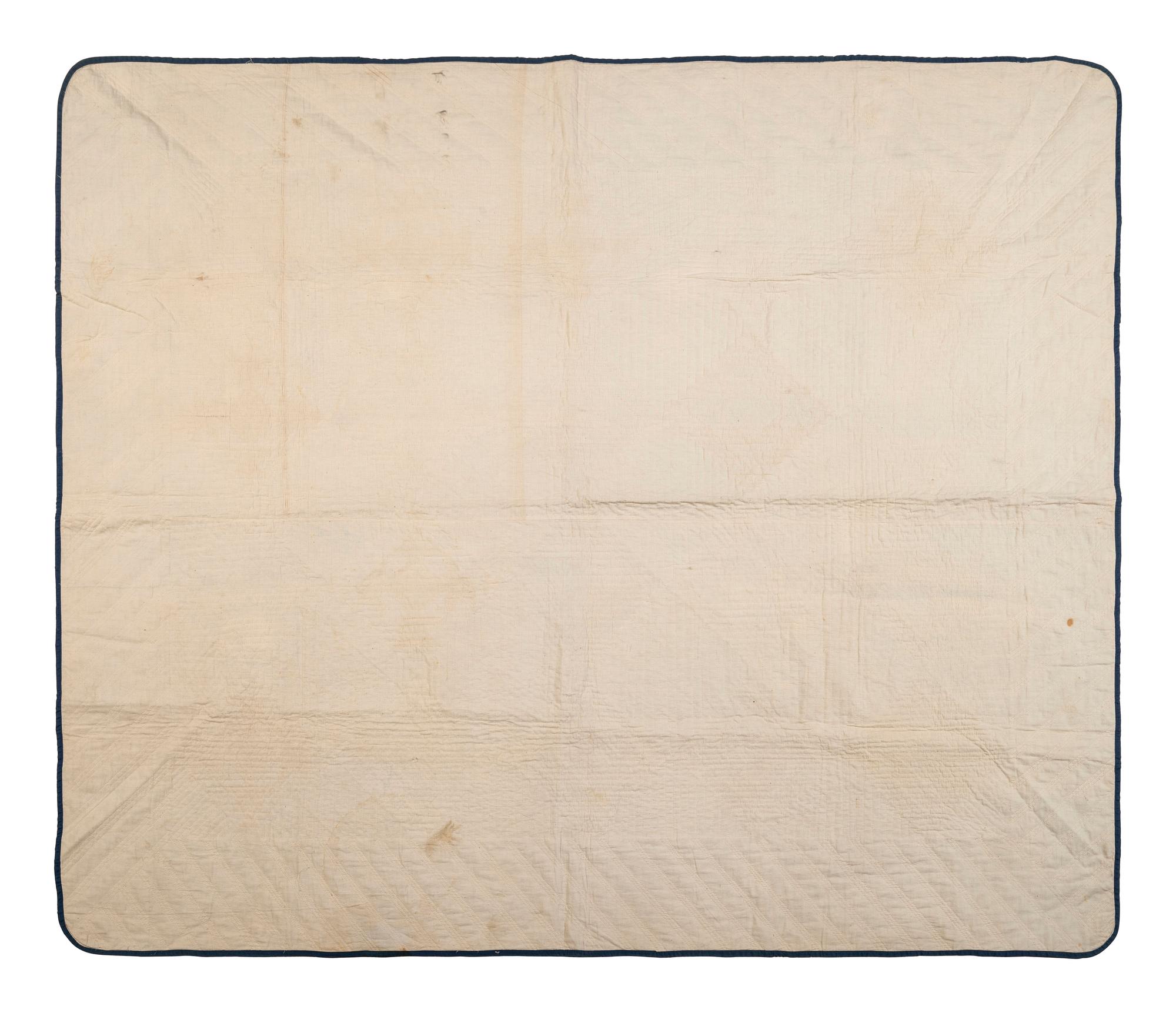 A Pieced Cotton 'Basket and Square' Pattern Quilt