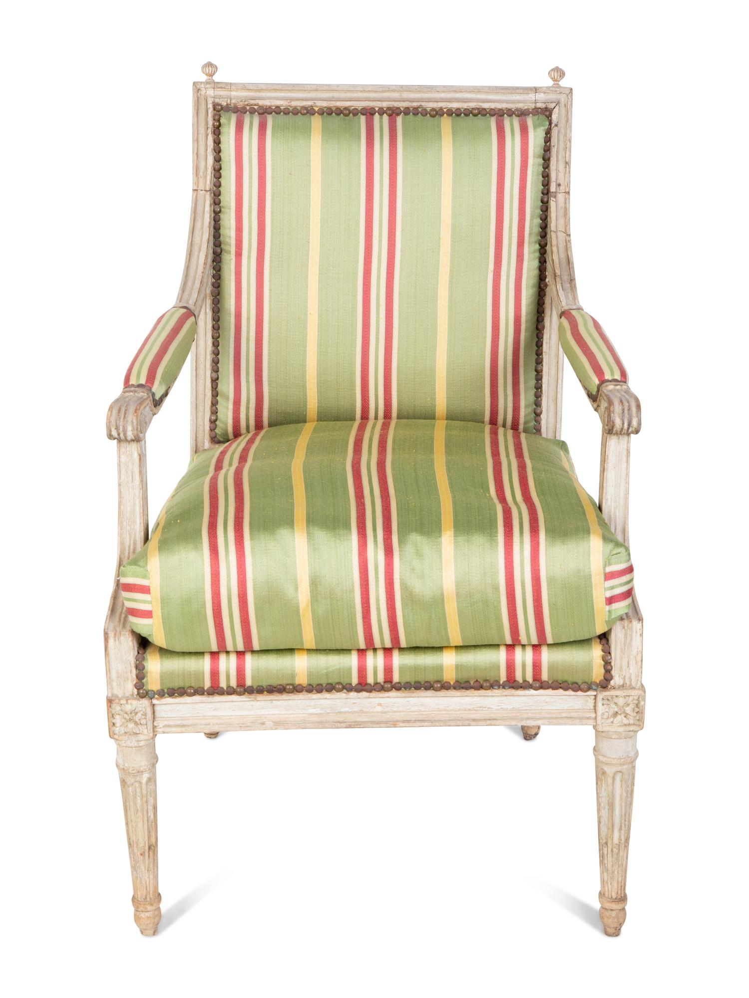 A Louis XVI Style Painted Fauteuil — 18TH/19TH CENTURY