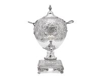 A George III sterling silver floral repoussé hot water urn, maker's mark rubbed, London, 1766