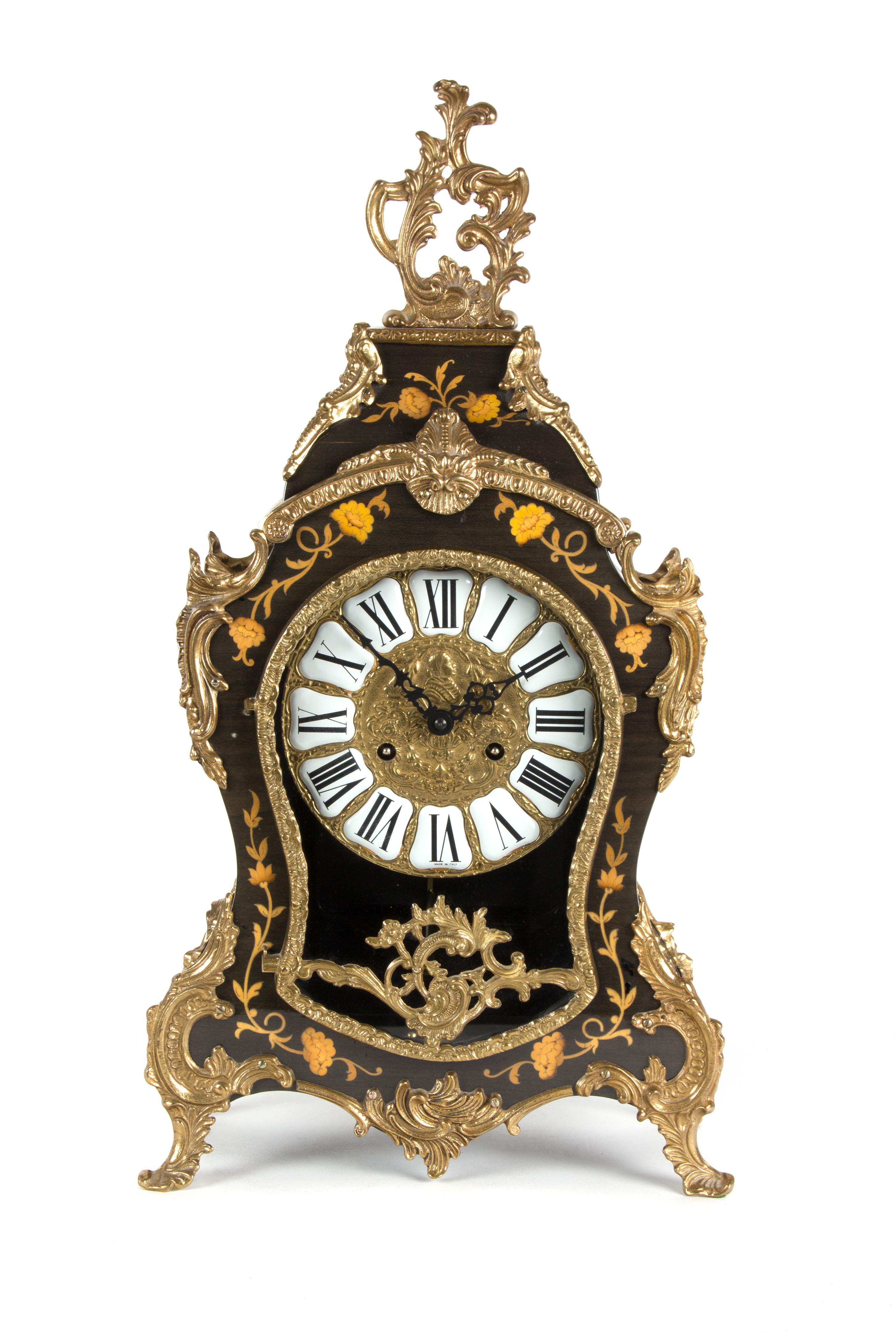 A German Louis XV Style Gilt Metal Mounted Marquetry Shelf Clock Height 22 1/4 inches. — Works by Franz Hermle