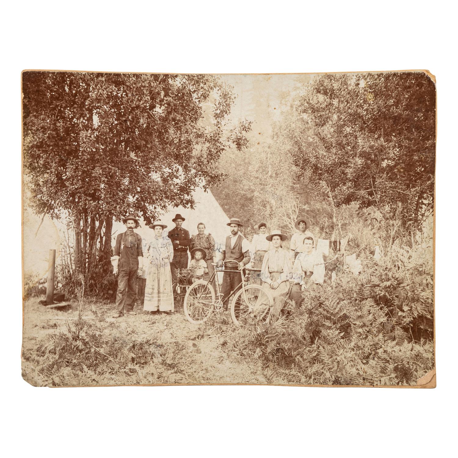 [BICYCLES]. A group of early photographs of cyclists, including children with tricycles, wagons, and riding toys.