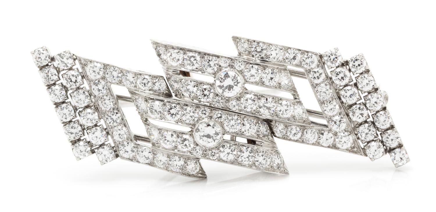 A Pair of Platinum and Diamond Dress Clips/Brooch, 12.00 dwts.