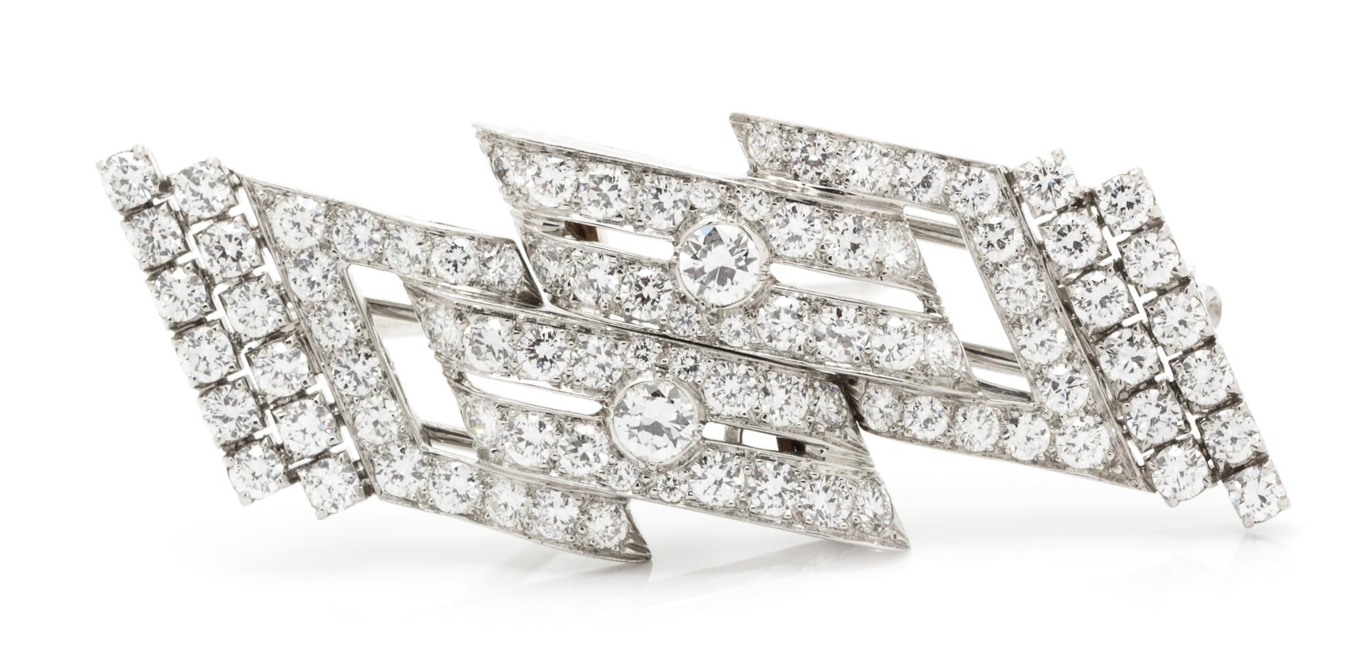 A Pair of Platinum and Diamond Dress Clips/Brooch, 12.00 dwts.