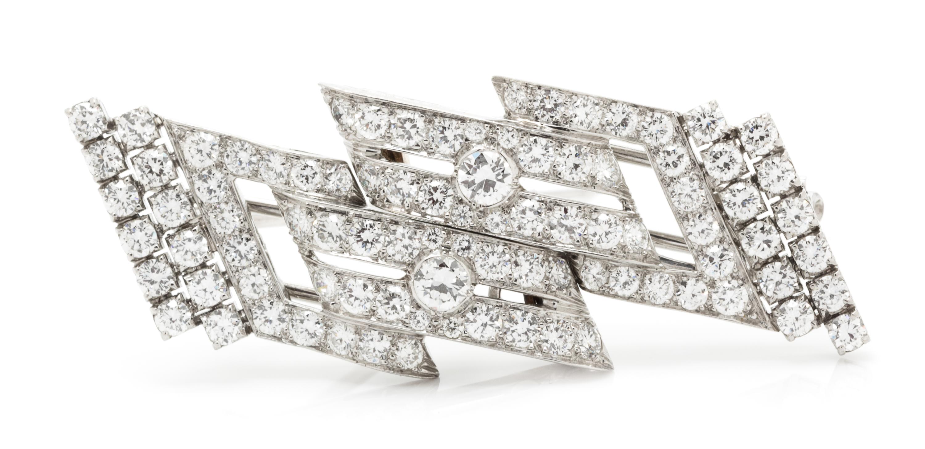 A Pair of Platinum and Diamond Dress Clips/Brooch, 12.00 dwts.
